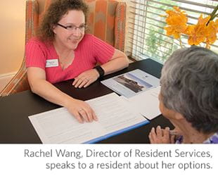 Vi at Highlands Ranch's director of resident services speaks to a resident about her options