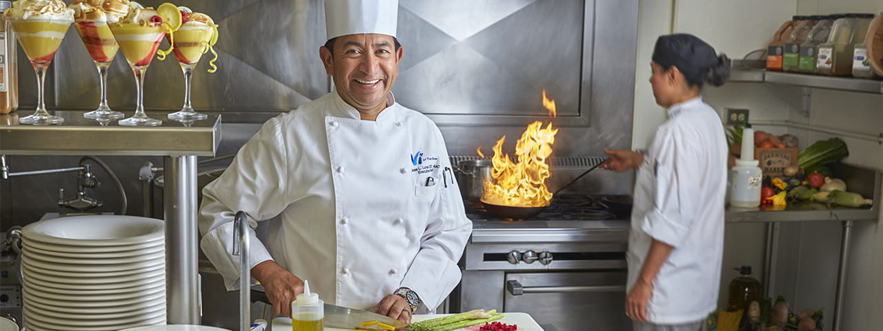 Jose Luna Vi at The Glen Executive Chef in kitchen with staff