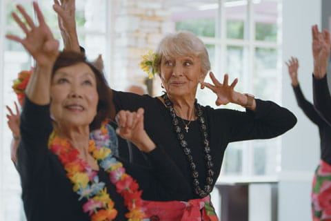 Vi at Palo Alto residents dance hula.