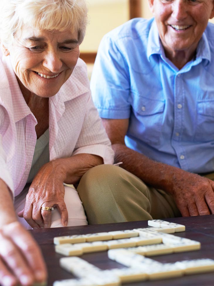 A woman and a man playing a game.