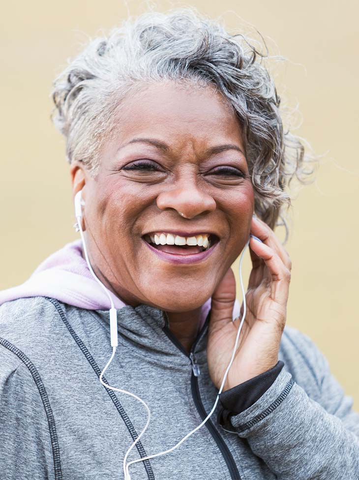 A woman smiling.