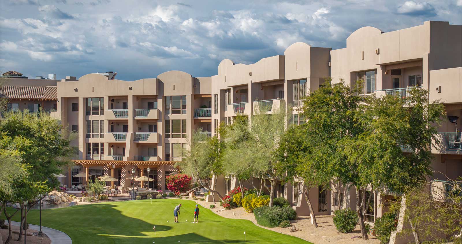 Vi at Grayhawk's putting green and apartments.