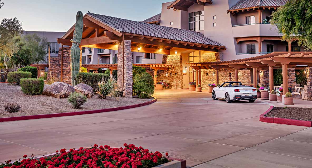 Vi at Grayhawk main entrance. 