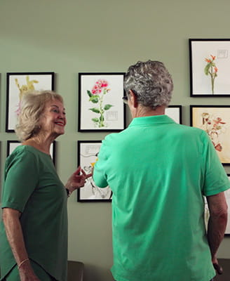 Resident artists view their exhibit at the Appaloosa Library.