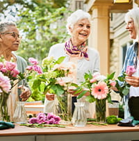A group of women gardening. 