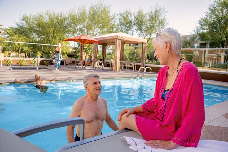 Residents enjoy the outdoor pool.