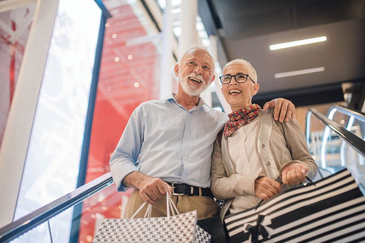 Man and woman shopping. 