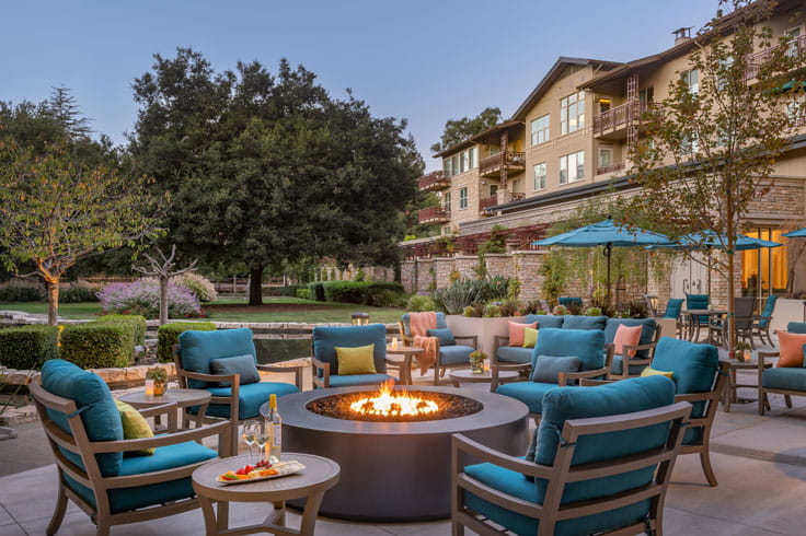 Vi at Palo Alto's outdoor fireplace.