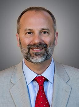 John Koselak Executive Director. 