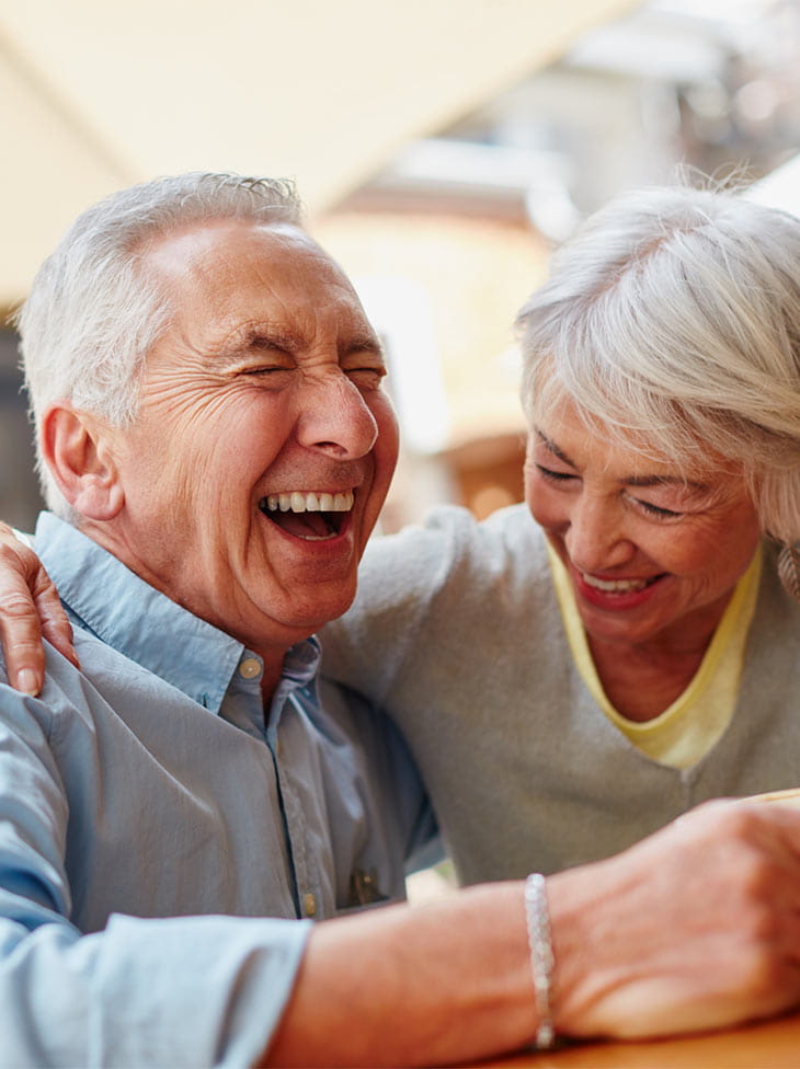 Couple laughing. 