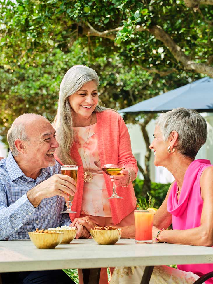 Seniors at happy hour outside.