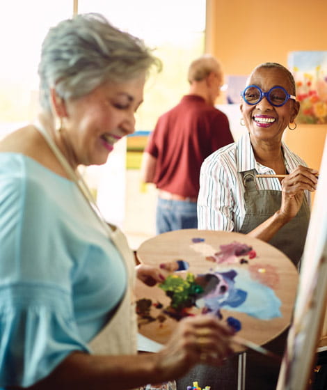 Residents paint at the in-house art studio.