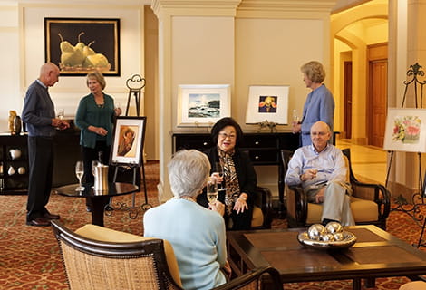 Residents socialize in a community space at Vi at La Jolla Village.
