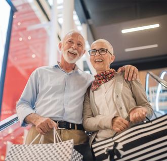 A couple at a shopping mall. 