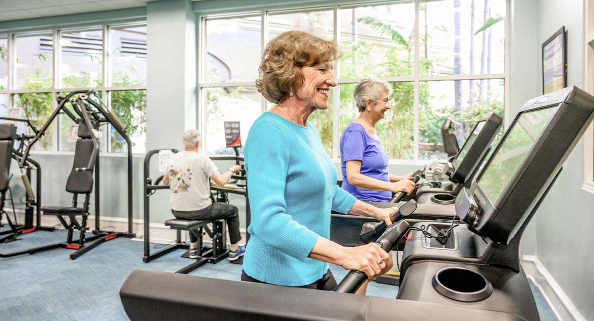 People exercising at the gym.  