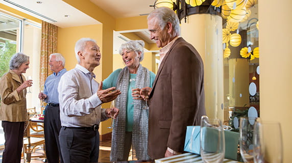 Residents socialize in a common space.
