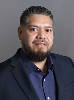 Armando Figueroa headshot. 