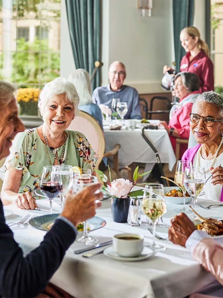 A group of people dining together.