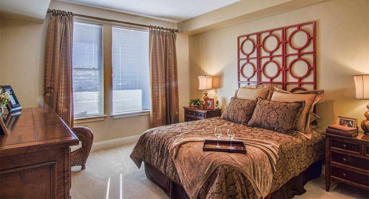 Model apartment bedroom. 