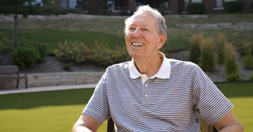 Lee Chouinard smiles at the camera