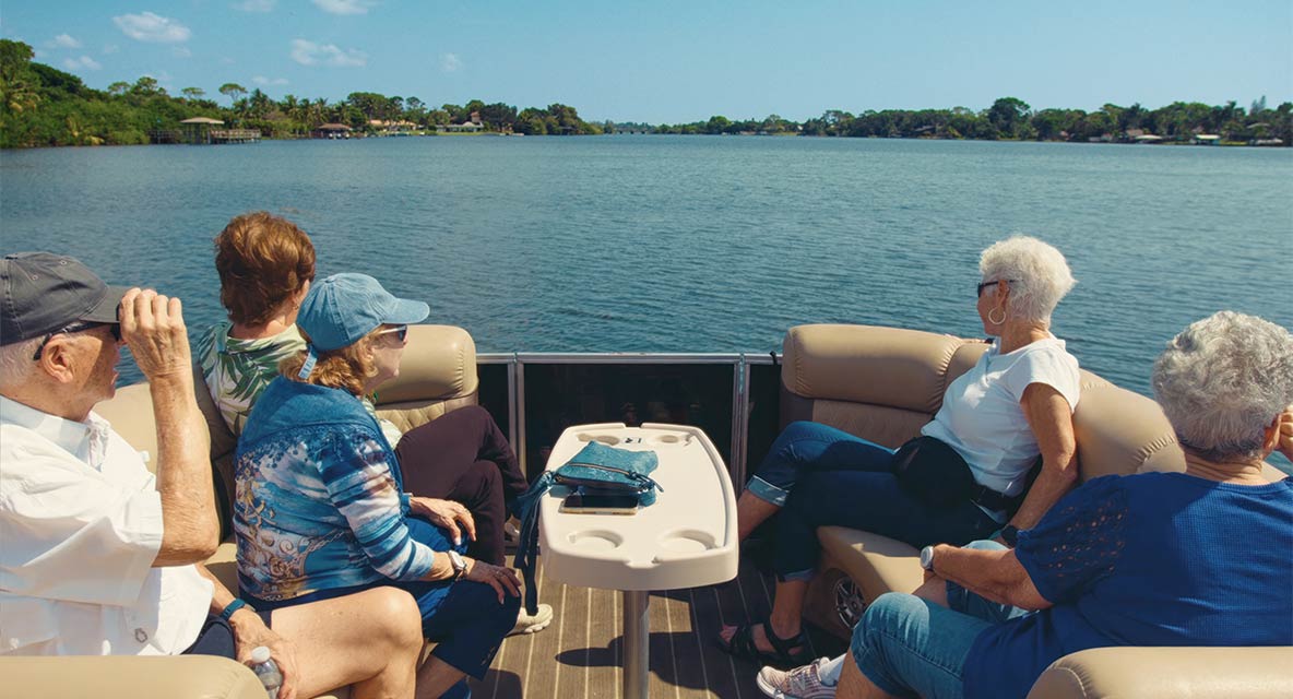 Residents of Vi at Lakeside Village on a boat. 