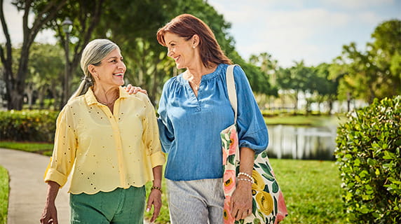 Women walking outside at Vi at Lakeside Village.