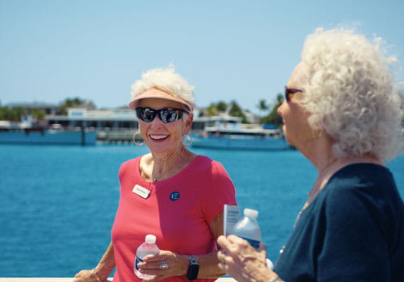 Lakeside Village residents wait to board the boat.