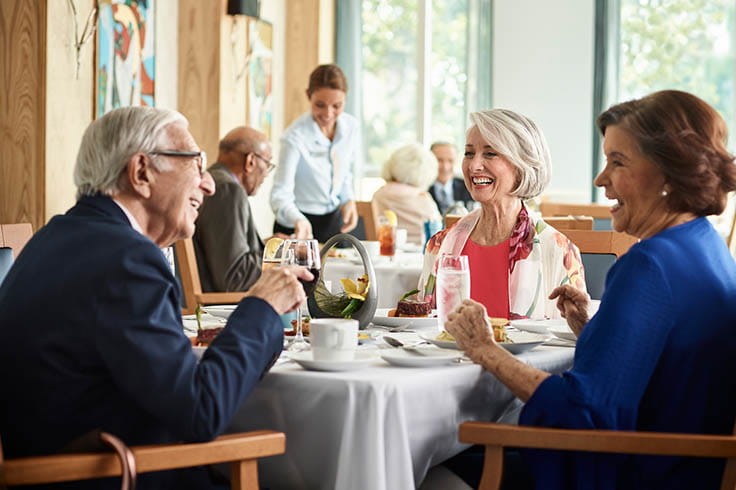 Group enjoying lunch in Azure restaurant