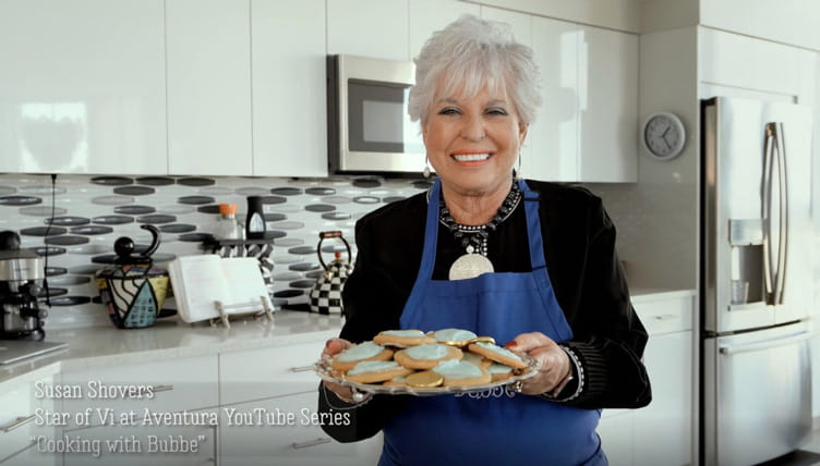 Bubbe holding a plate of cookies.