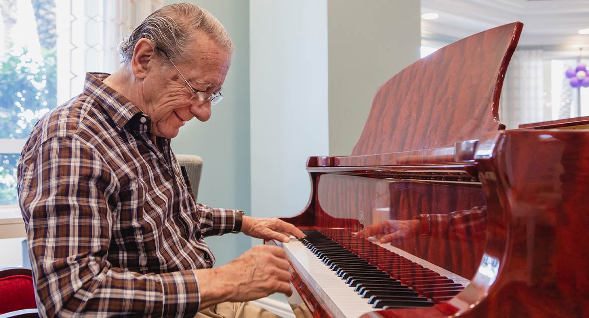 A man playing the piano. 