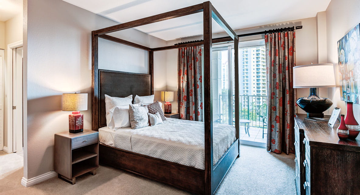 Primary bedroom in the Picasso apartment at Vi at Aventura