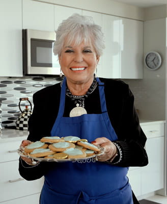 Susan Shovers holds a plate of cookies