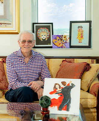 Hank Solomon and his paintings.