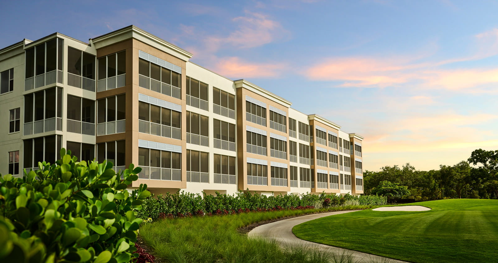 The exterior of a Phase 6 building at sunset.