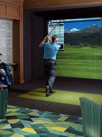 A man uses one of the golf simulators at Vi at Bentley Village.