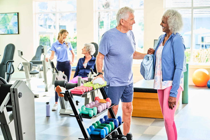Residents use the gym facilities.
