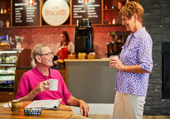 Residents chat at Cafe Biscotti