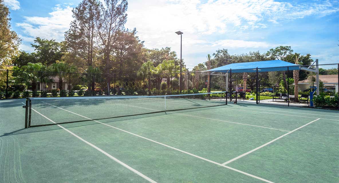 Tennis court at Vi at Bentley Village. 