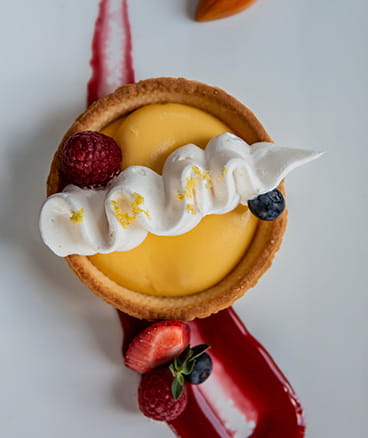 Mini tart with lemon zest, one of many desserts offered at Vi at Bentley Village