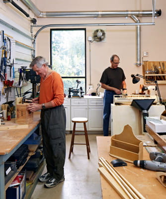 Residents work in the woodshop.