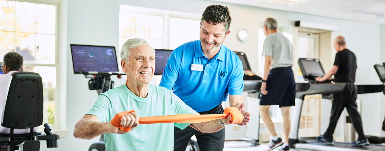 A man receives a personalized workout.
