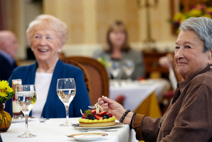 Women attend an event.