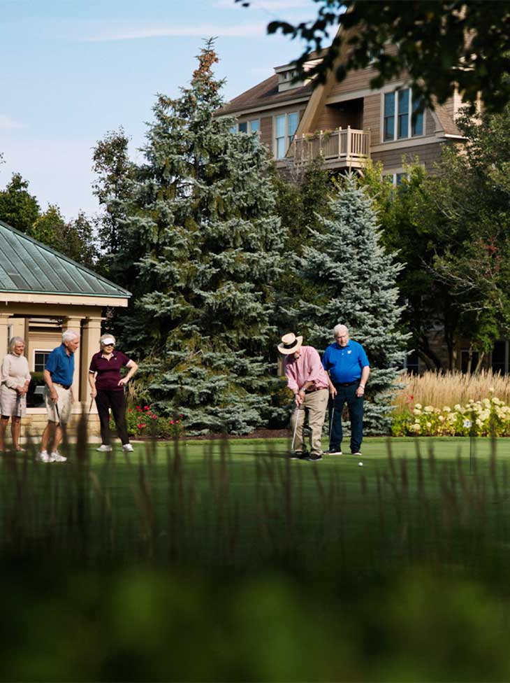 A group golfing at Vi at The Glen. 