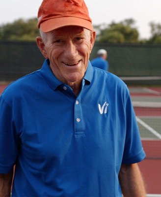 A pickleball player on the court.