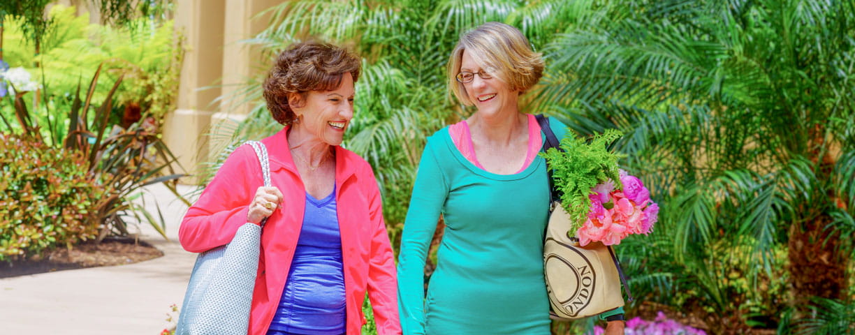 Two women walk outside at Vi at La Jolla Village.