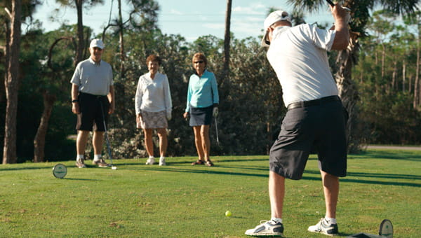A group of Bentley Village residents enjoys a round of golf.