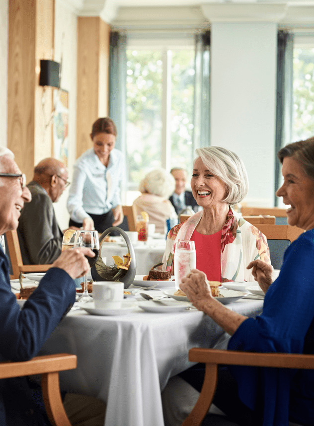 Vi residents enjoying a meal together.