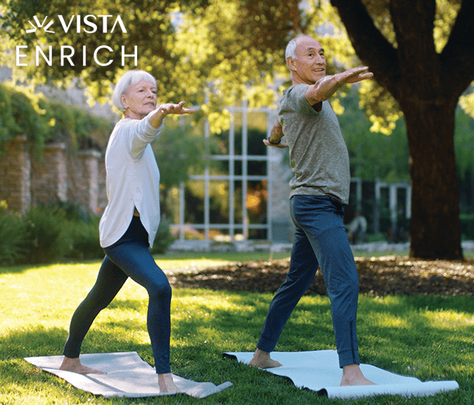 A couple does yoga outside Vi at Palo Alto.