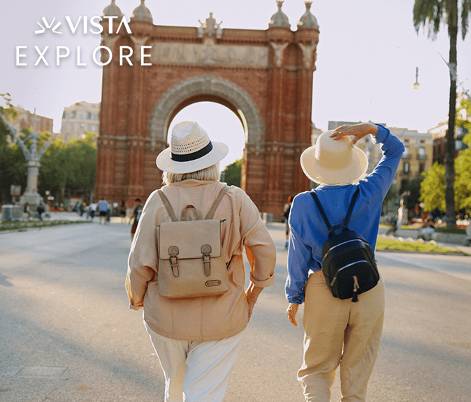 Two women, backs to the camera, sight see.